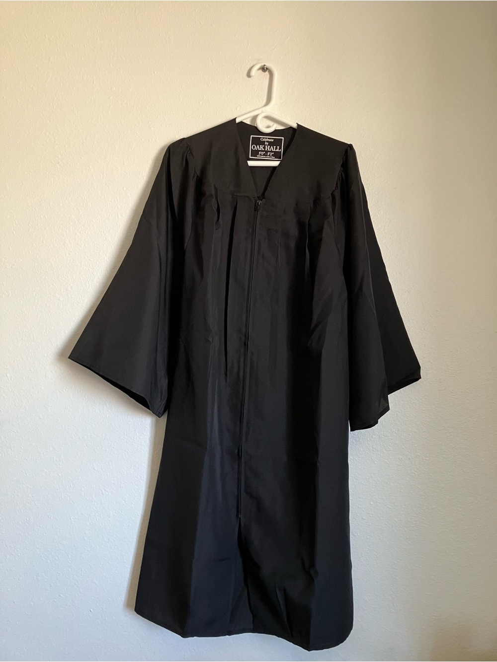 Black graduation cap and gown